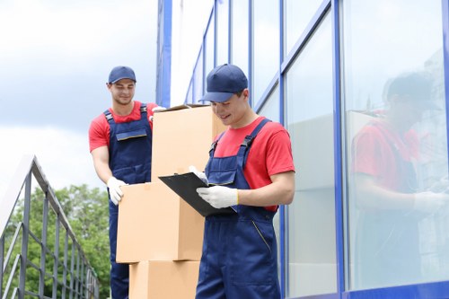 Moving boxes and furniture in Kentish Town during a local relocation