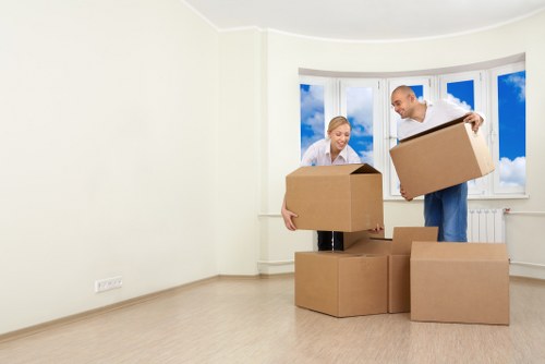 Moving truck loading furniture for a local flat move in Kentish Town