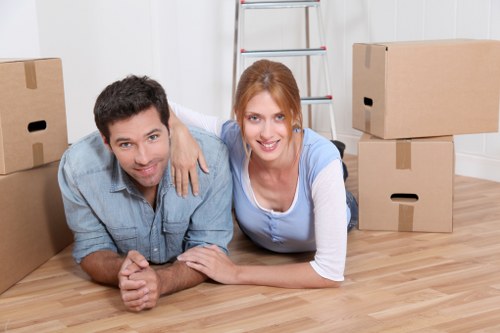 Commercial moving team handling office furniture and equipment