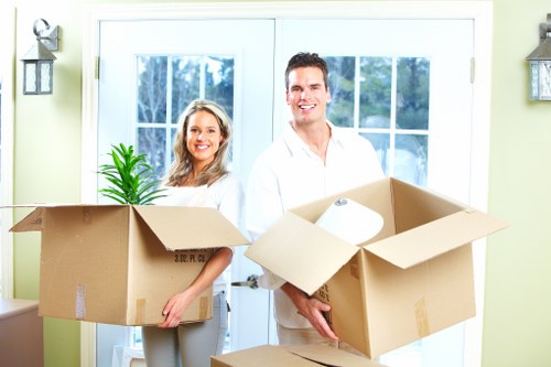 Careful loading of boxed household items for a Kentish Town flat move